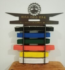 Estand para cinturones